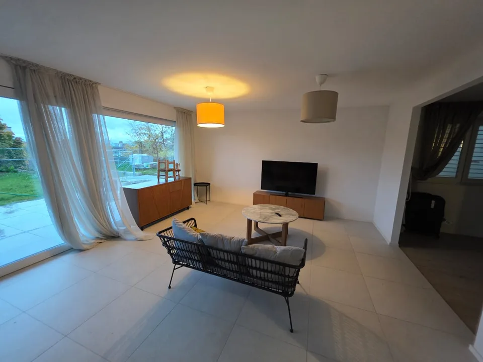 Un jardin comme une villa. Le confort d'un appartement neuf.