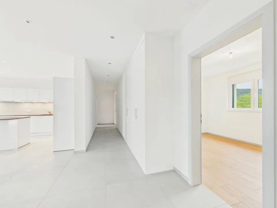 Appartamento attico esclusivo con grande terrazza e zona residenziale tranquilla