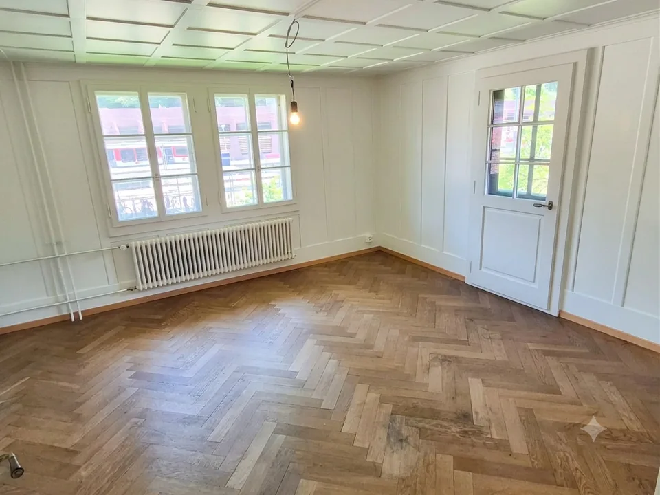 Delizioso appartamento di 3.5 locali in un edificio storico con vista sulla montagna a Giswil