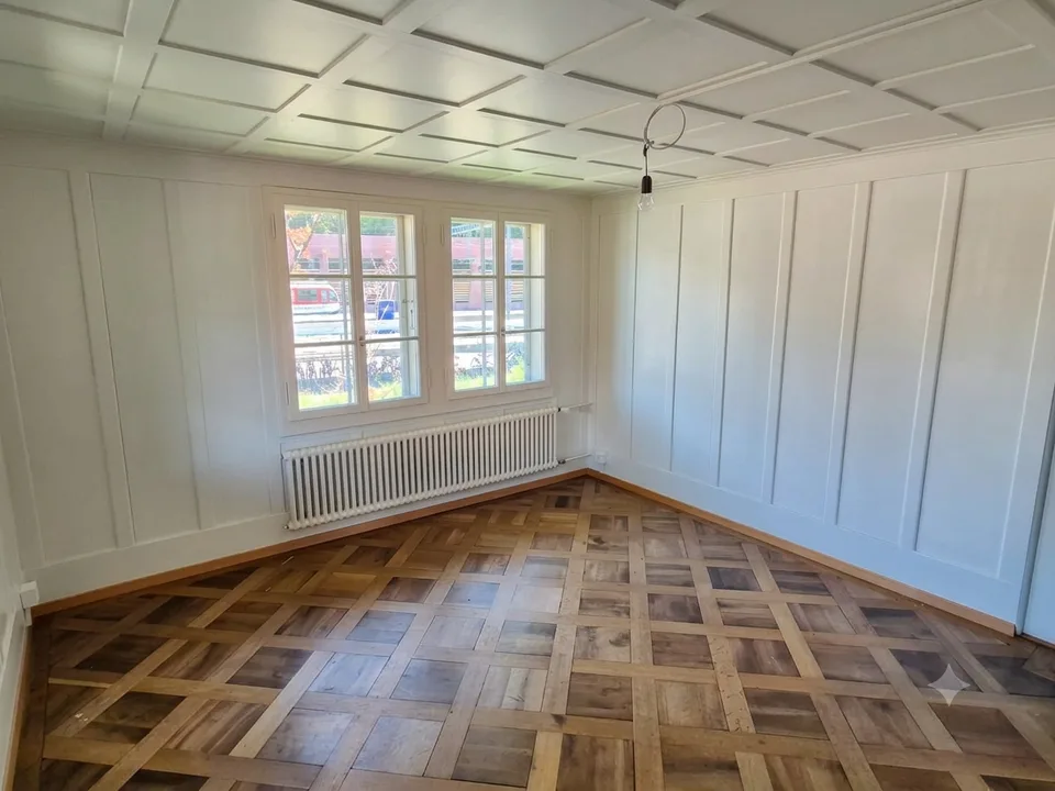 Delizioso appartamento di 3.5 locali in un edificio storico con vista sulla montagna a Giswil