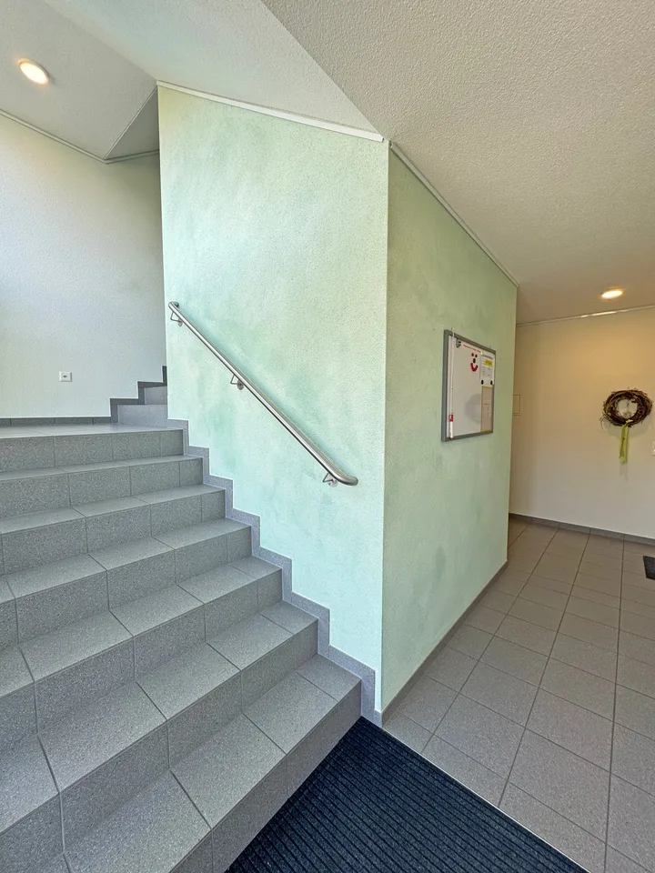Attractive condominium, 4½ rooms on the ground floor, with private green space and underground parking