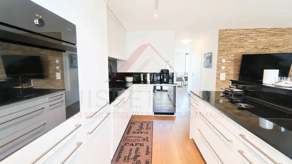 Exklusive 5.5 Zimmer Maisonette mit Designküche, Loggia und Minergie Standard