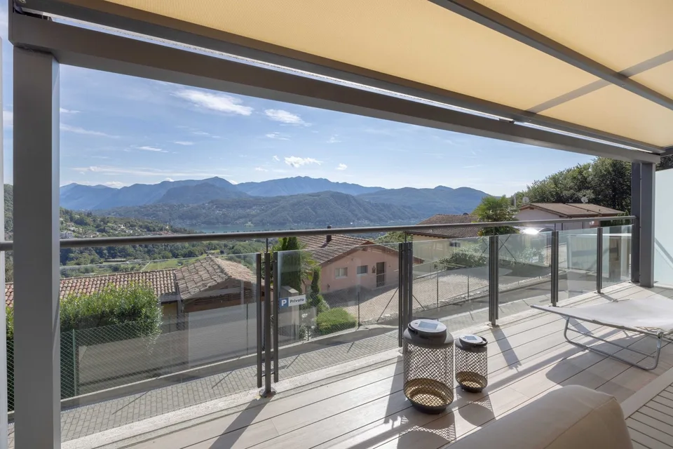 BELLISSIMA E MODERNA CASA 4.5 LOCALI CON VISTA LAGO A PURA