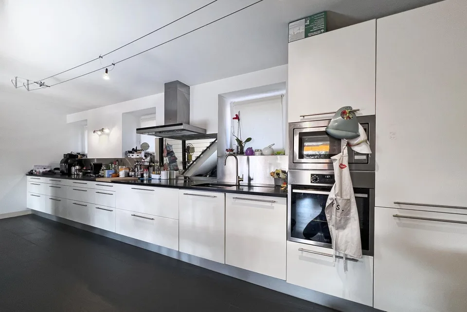 Geräumiges Duplex mit 3.5 Zimmern und privatem Garten in Agno