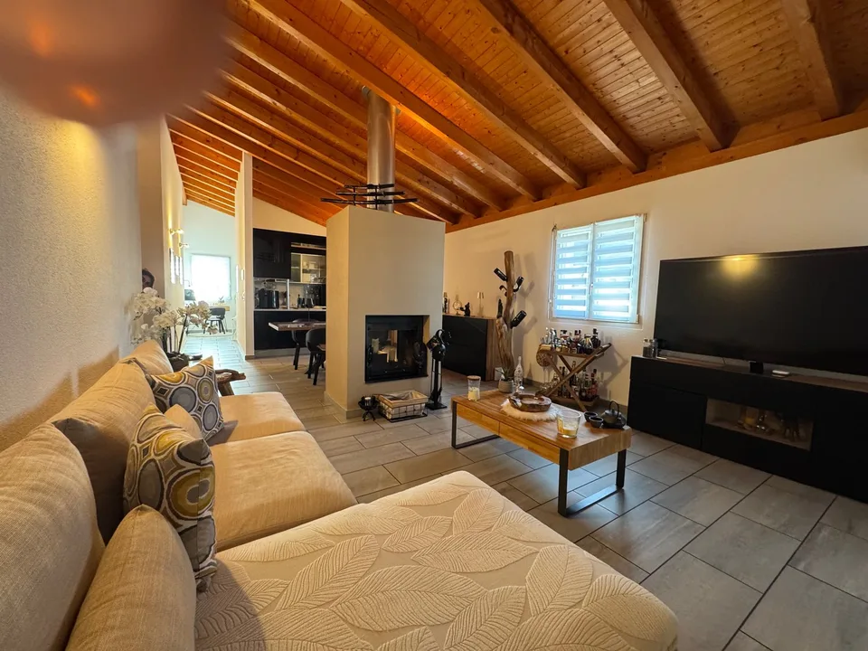 Appartamento mansardato con terrazza e vista aperta