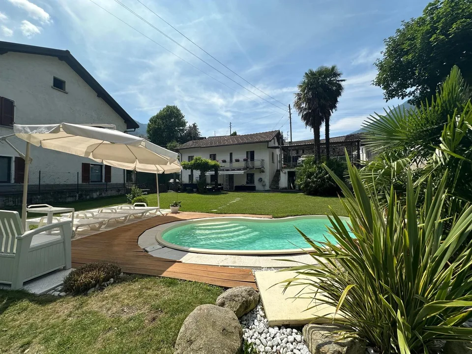 BELLA CASA 4.5 DI CHARME CON GIARDINO E PISCINA A ROVEREDO