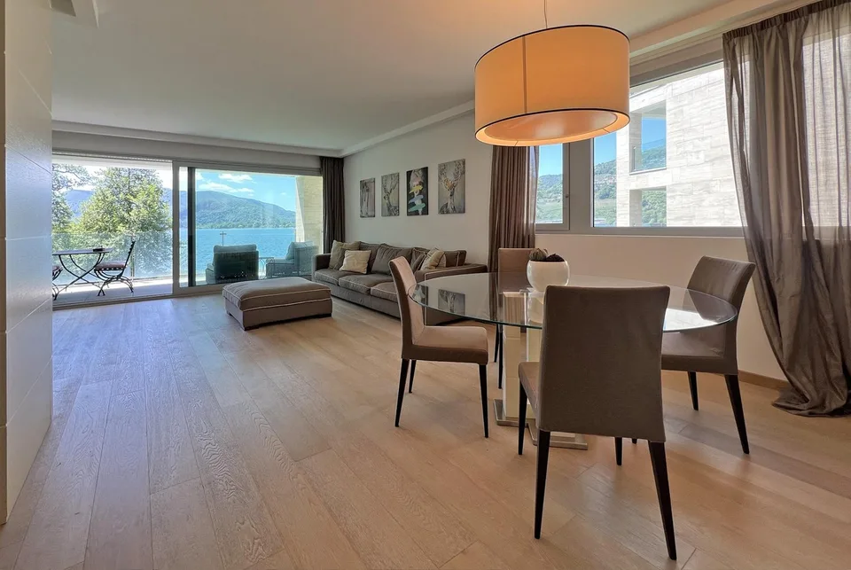 STUPENDES UND MODERNES 4.5-ZIMMER-WOHNUNG MIT TERRASSE UND SEEBLICK IN MUZZANO
