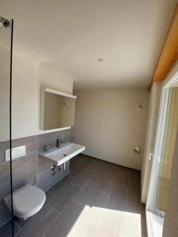 Exclusive 2.5-room attic apartment with approximately 74 m² sun terrace - First occupancy in new building – photo 9 of 13