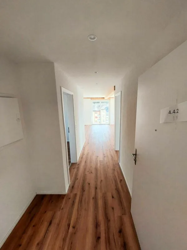 Appartement attique exclusif de 2,5 pièces avec environ 74 m² de terrasse ensoleillée - Première occupation dans un nouvel immeuble