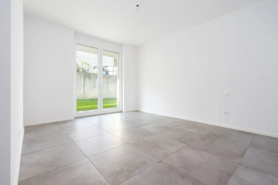 Appartement moderne 2.5 pièces avec jardin - Objet de rendement