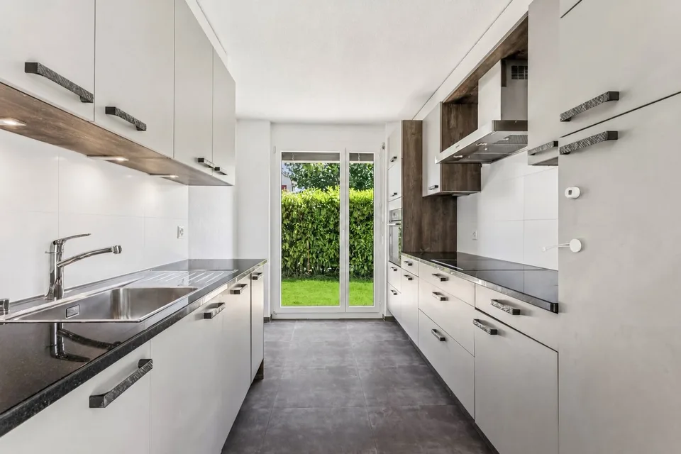 Apartment 4.5 rooms, terrace, private garden and train station within a few meters