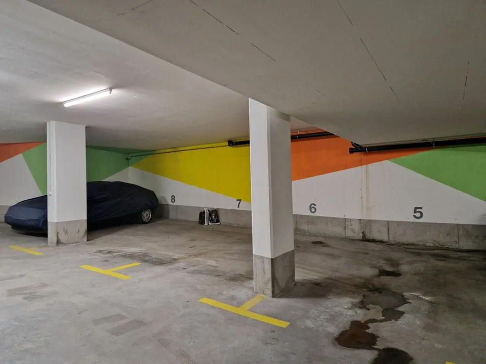 Place de parking en garage souterrain à Mels