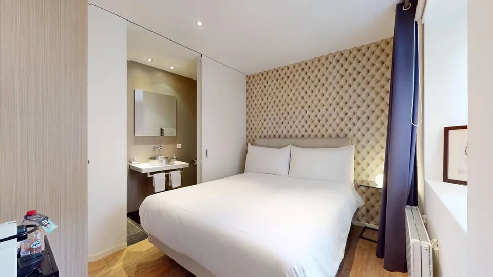 Chambre idéalement située dans immeuble au bord du lac