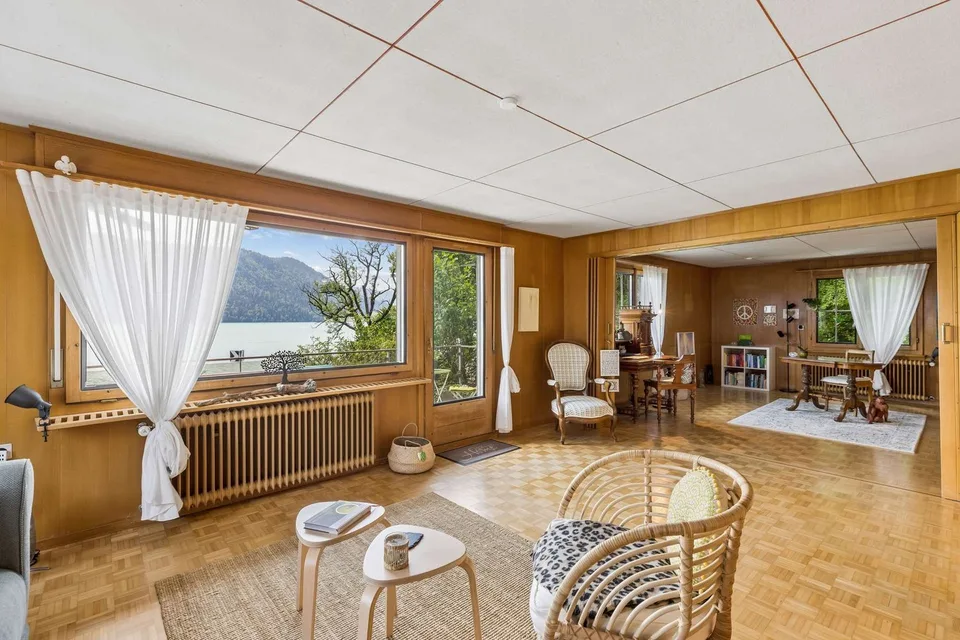 Fully rented three-family house on Lake Ägeri - potential for replacement new building