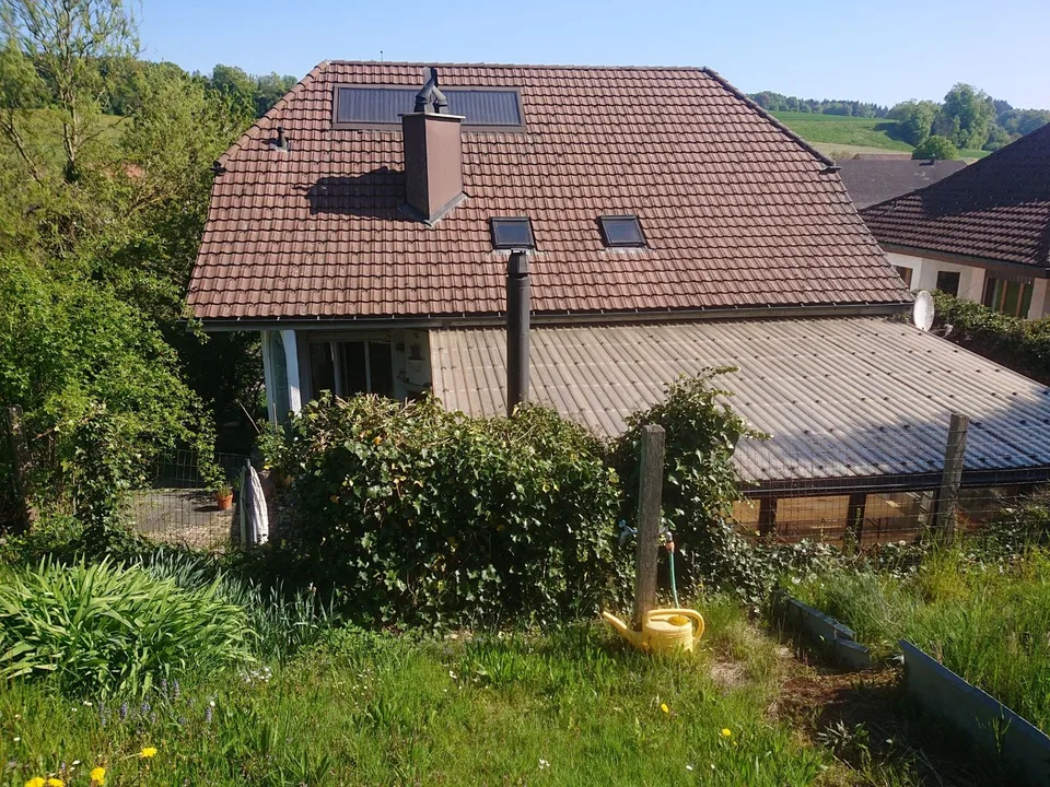 Superbe maison unifamiliale 9 1/2 pièces dans un cadre verdoyant