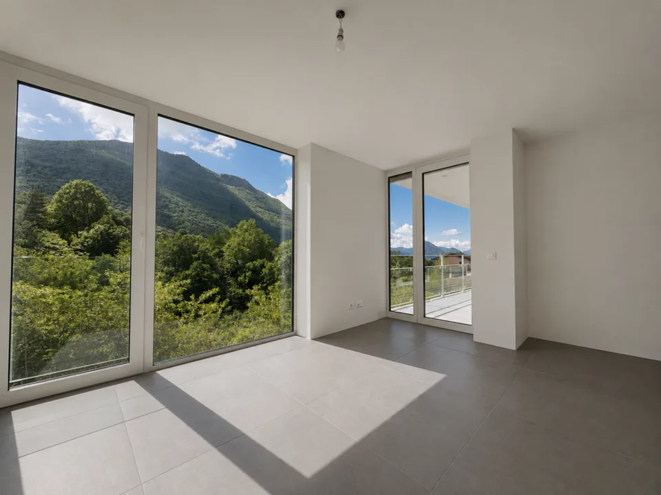 Appartamento con terrazza e splendida vista su Lugano e le montagne