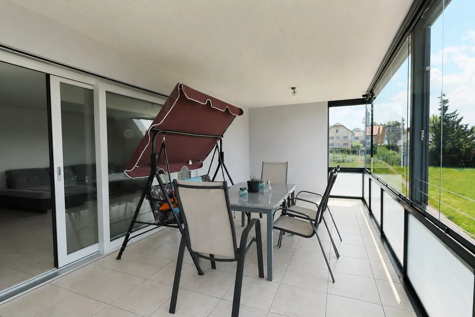 Grosszügige 4.5-Zimmer-Eigentumswohnung mit verglastem Balkon in Re... – Foto 14 von 19