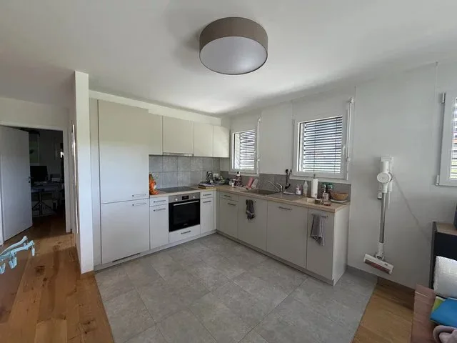 Bel appartement de 4.5 pièces au rez-de-chaussée avec jardin privatif