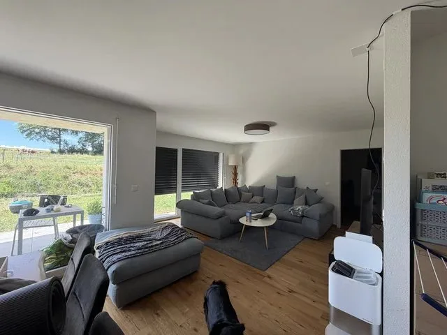 Bel appartement de 4.5 pièces au rez-de-chaussée avec jardin privatif