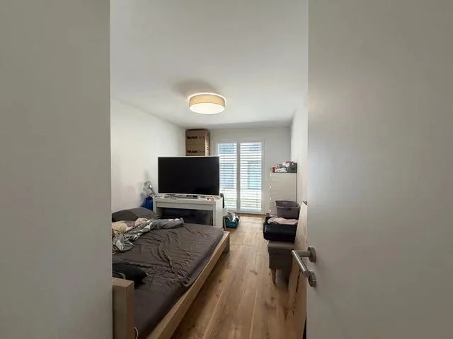 Bel appartement de 4.5 pièces au rez-de-chaussée avec jardin privatif