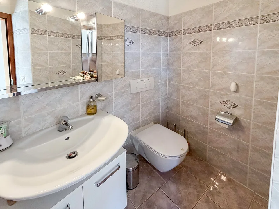 Elegante villa unifamiliare con spettacolare vista aperta sul Lago di Lugano – foto 19 di 24