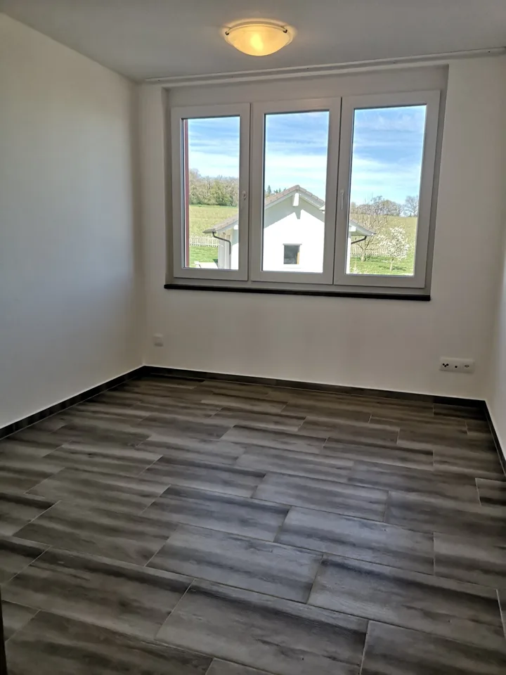 Appartement neuf au 1er étage avec terrasse couverte, avec vue.