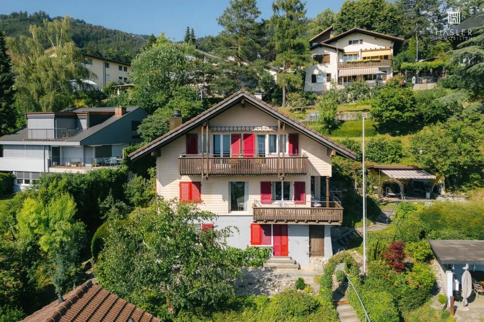 Casa a 2 famiglie con vista fantastica sul lago di Thun e le montagne