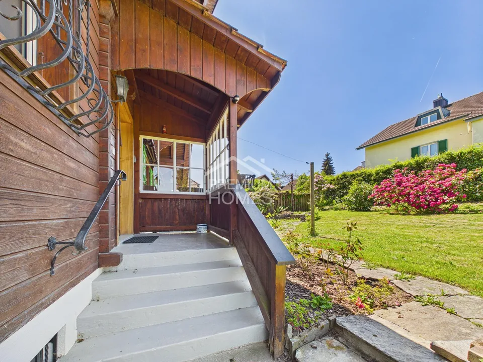 Chalet-Flair mit traumhafter Gartenidylle