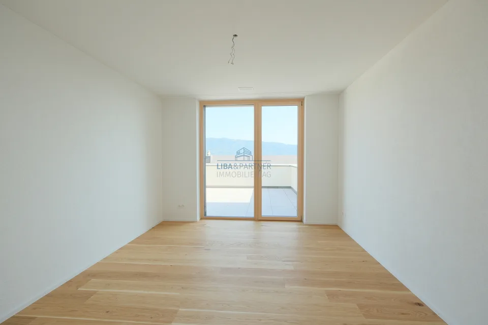 Attraktive 3.5-Zimmer-Terrassenwohnung in ruhiger Hanglage mit Rheinblick