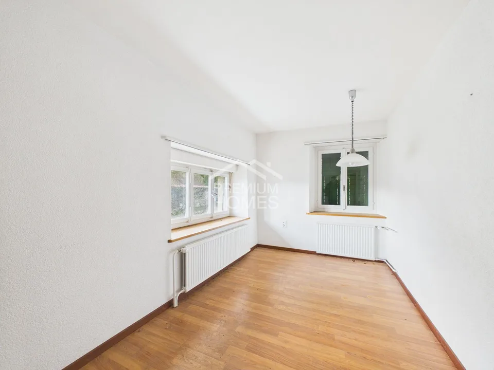 Casa a schiera versatile con potenziale di ampliamento in posizione soleggiata