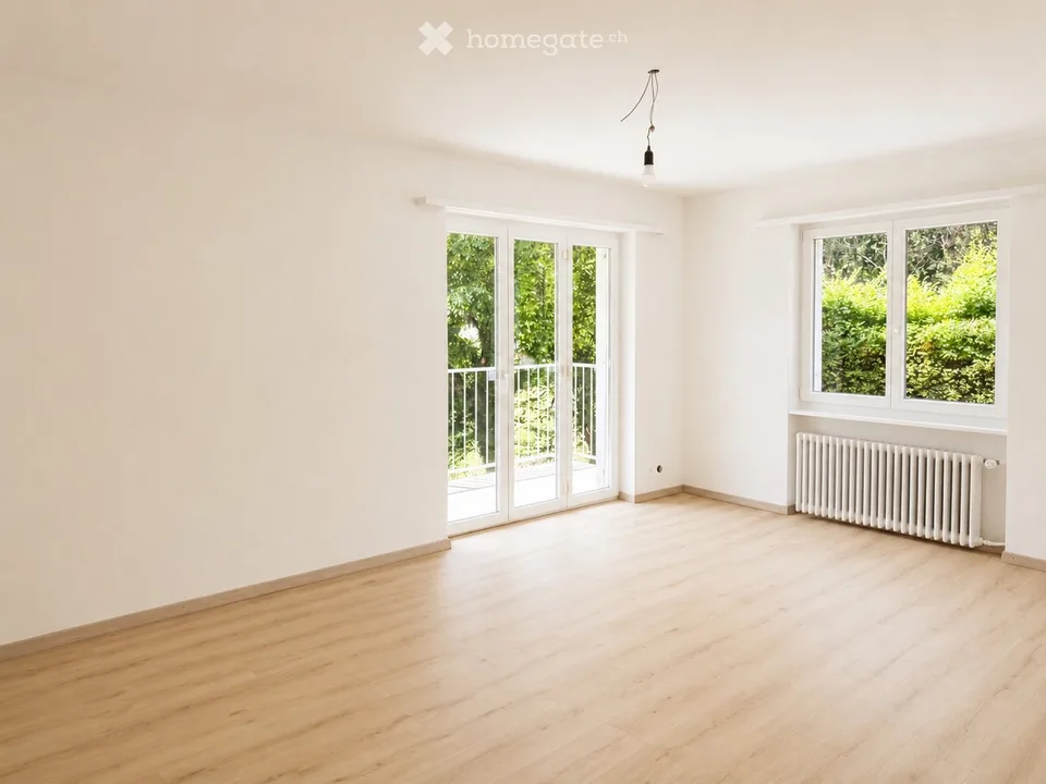 Appartement de 4,5 pièces avec balcon et jardin privatif