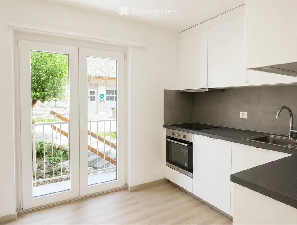 Appartement de 4,5 pièces avec balcon et jardin privatif