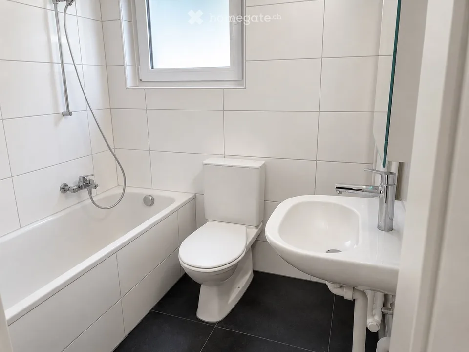 Appartement de 4,5 pièces avec balcon et jardin privatif