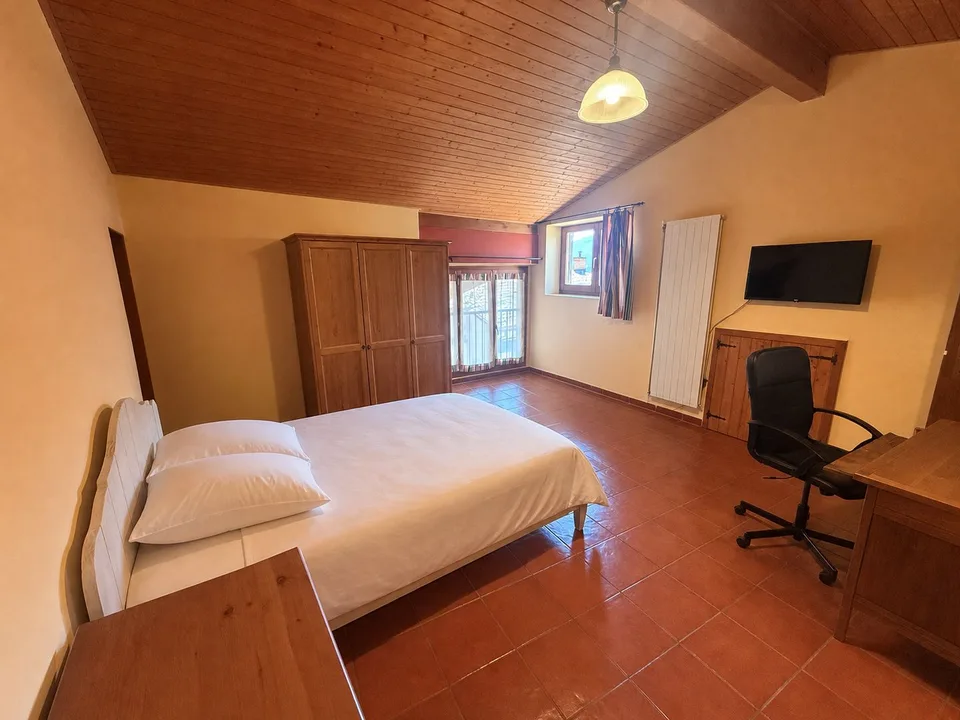 Charming Multi-Family Property with 3 Residential Units in the Heart of Melano