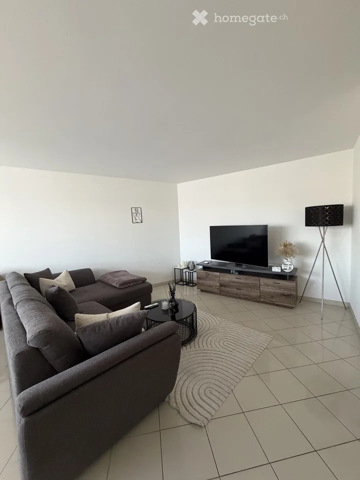 Bright 2.5-room apartment with balcony, distant view, and modern kitchen