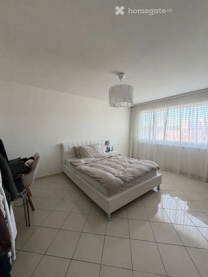Bright 2.5-room apartment with balcony, distant view, and modern kitchen