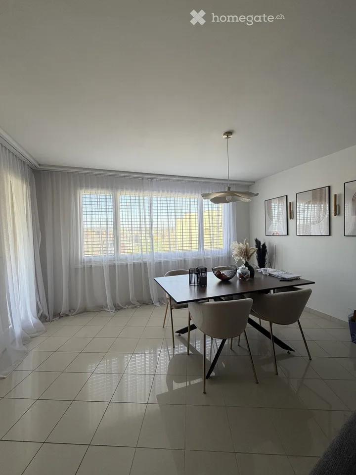 Bright 2.5-room apartment with balcony, distant view, and modern kitchen