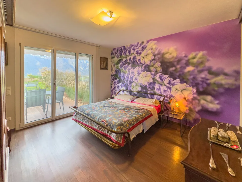 Appartamento vista lago con giardino a Bissone