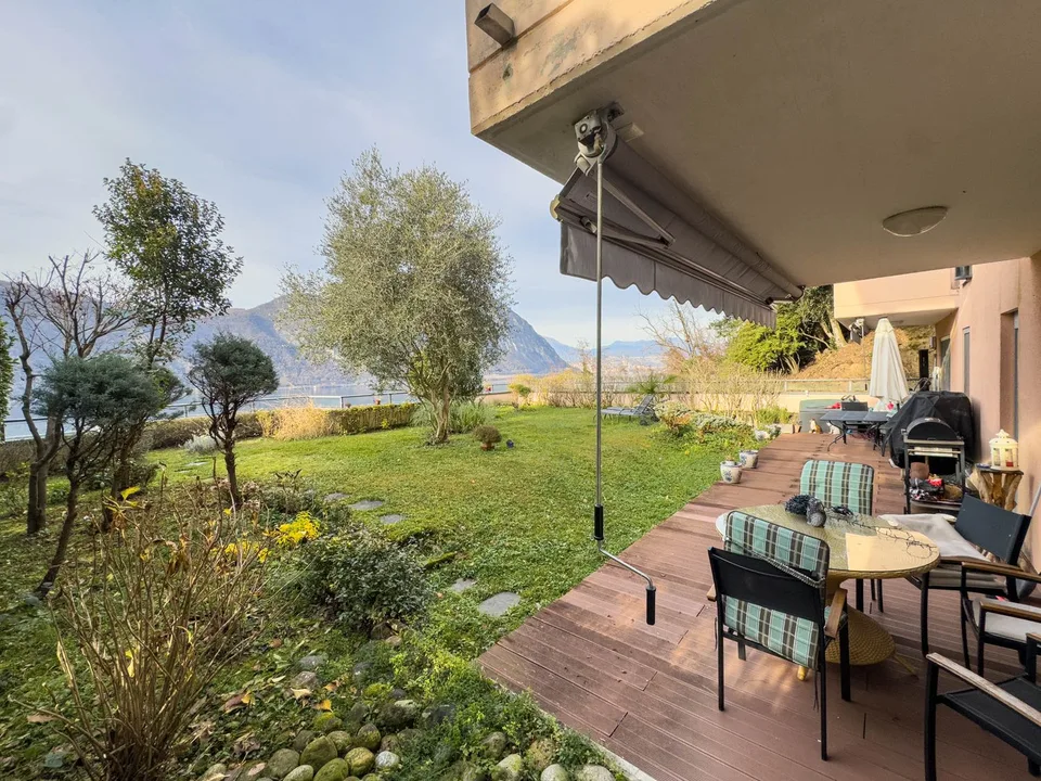 Appartamento vista lago con giardino a Bissone