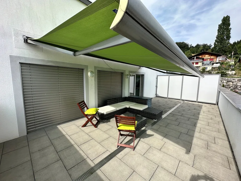 Appartement attique spacieux 2.5 pièces dans un environnement verdoyant