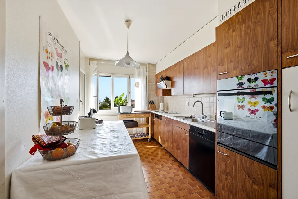 Appartamento di 4,5 locali con giardino, vista lago e montagna