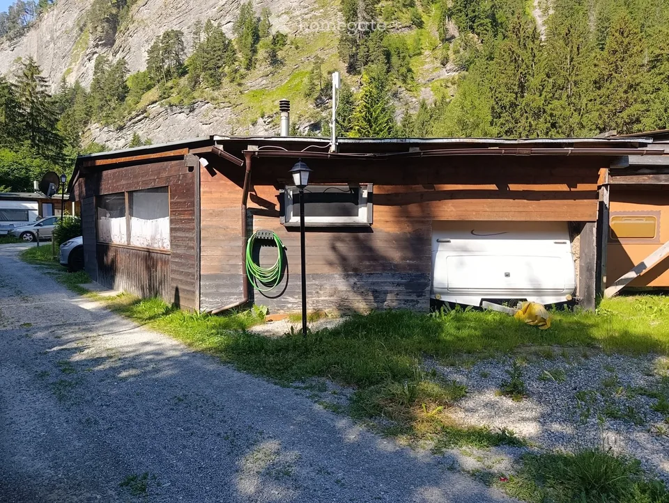Festbau mit Wohnwagen  Erstwohnsitz möglich
