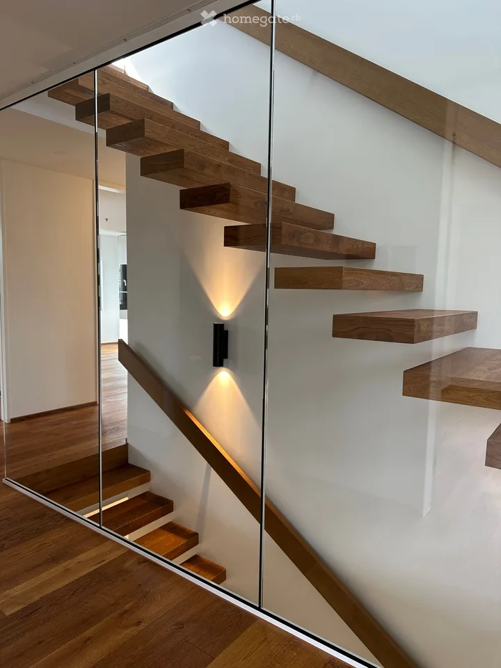 Appartement/penthouse attique exclusif de 5,5 pièces dans un emplacement très convoité avec vue sur les Alpes