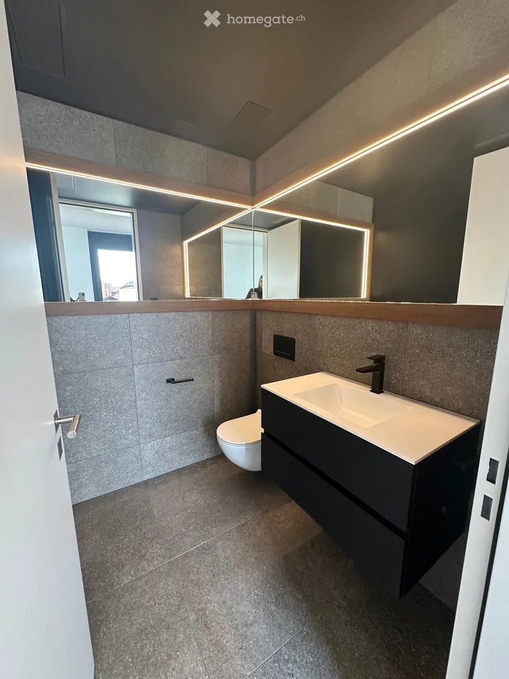 Appartement/penthouse attique exclusif de 5,5 pièces dans un emplacement très convoité avec vue sur les Alpes