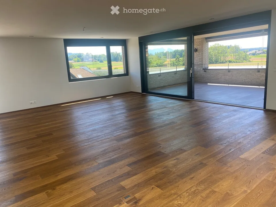 Appartement/penthouse attique exclusif de 5,5 pièces dans un emplacement très convoité avec vue sur les Alpes