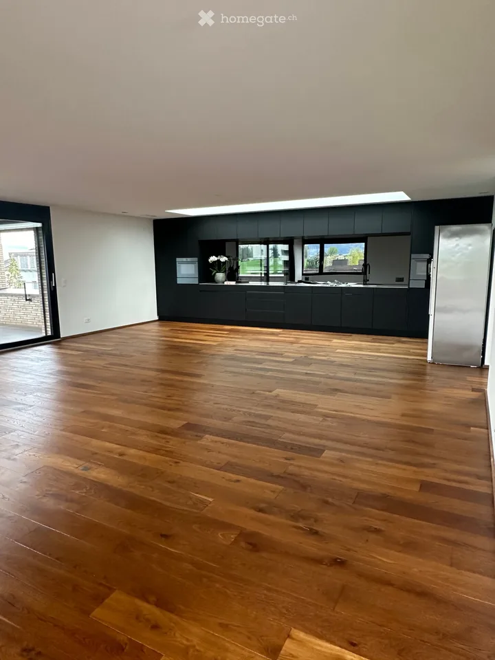 Appartement/penthouse attique exclusif de 5,5 pièces dans un emplacement très convoité avec vue sur les Alpes
