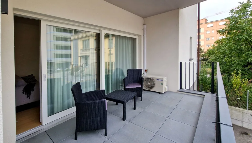 Elegantes 3,5-Zimmer-Wohnung in sorgfältig renoviertem Innenhof.