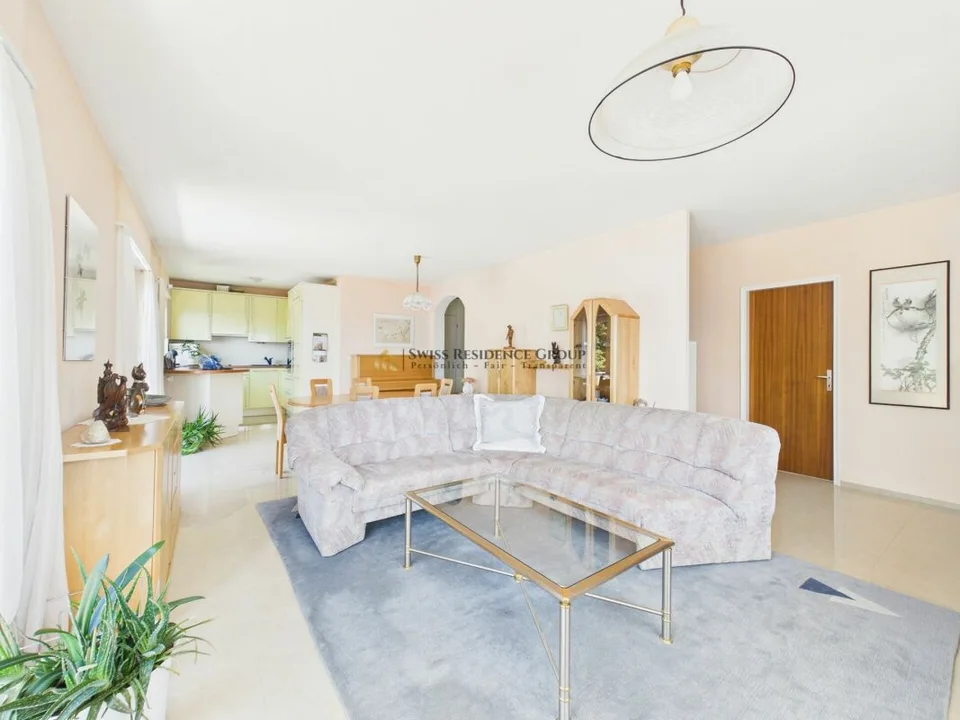Elegante appartamento mansardato con vista mozzafiato sul Lago di Lugano