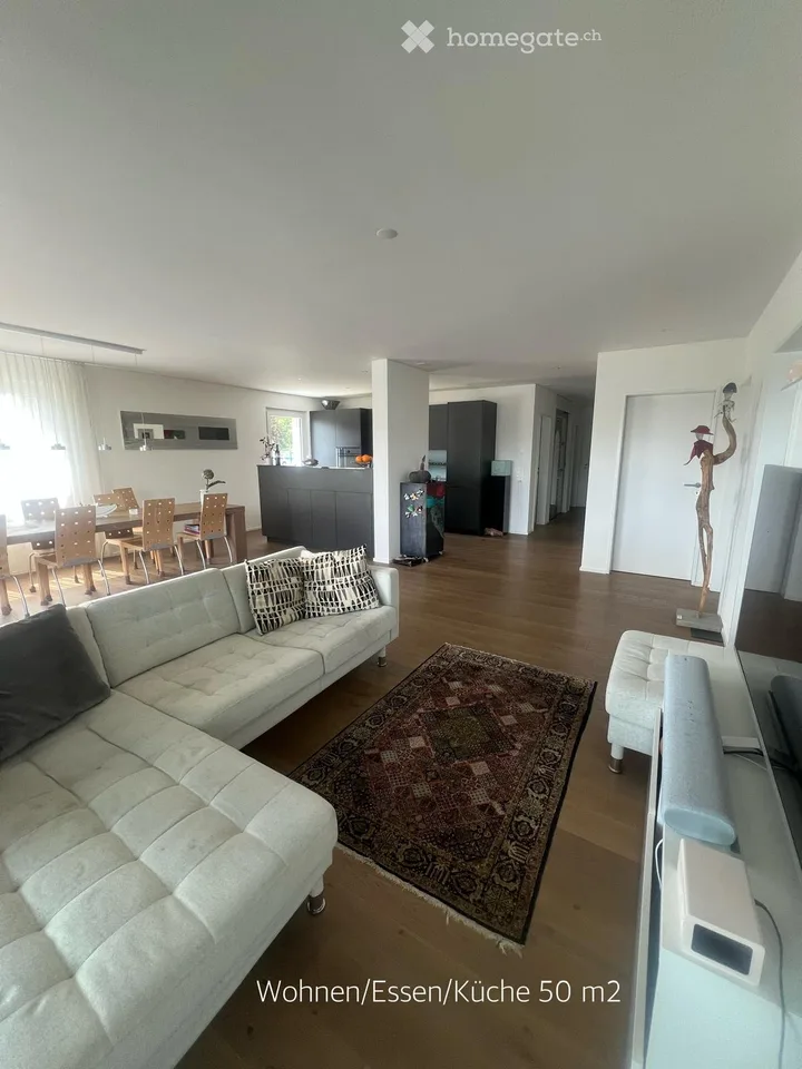 Exklusive 3.5-Zimmer-Eigentumswohnung mit 15 m² Büro und 23.5 m² Balkon