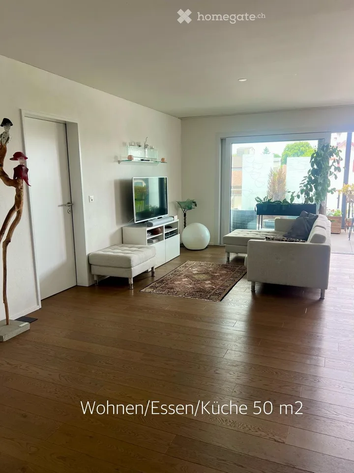Exklusive 3.5-Zimmer-Eigentumswohnung mit 15 m² Büro und 23.5 m² Balkon